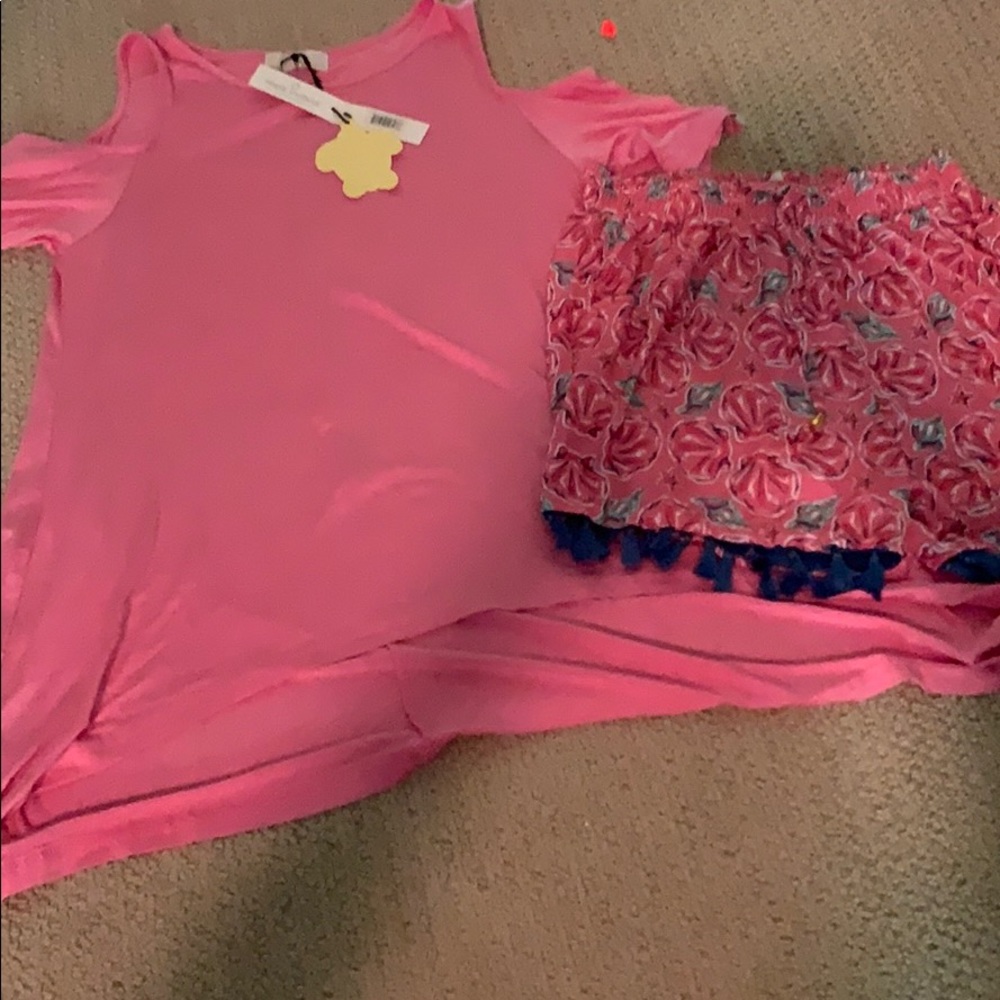 Brand new. Pair of light short and dress